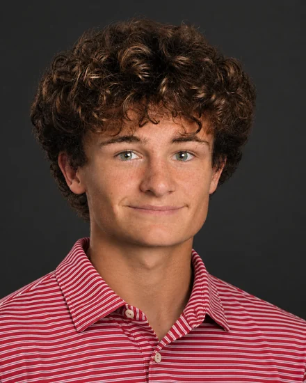 Logan Holby in the red Slicio polo